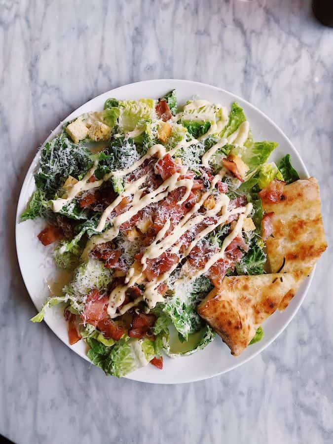 Caesar salad with bacon, parmesan and flatbread